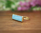 Amazonite gold bar ring featuring a natural blue stone on a 14k gold filled band, ideal for self-love and communication.