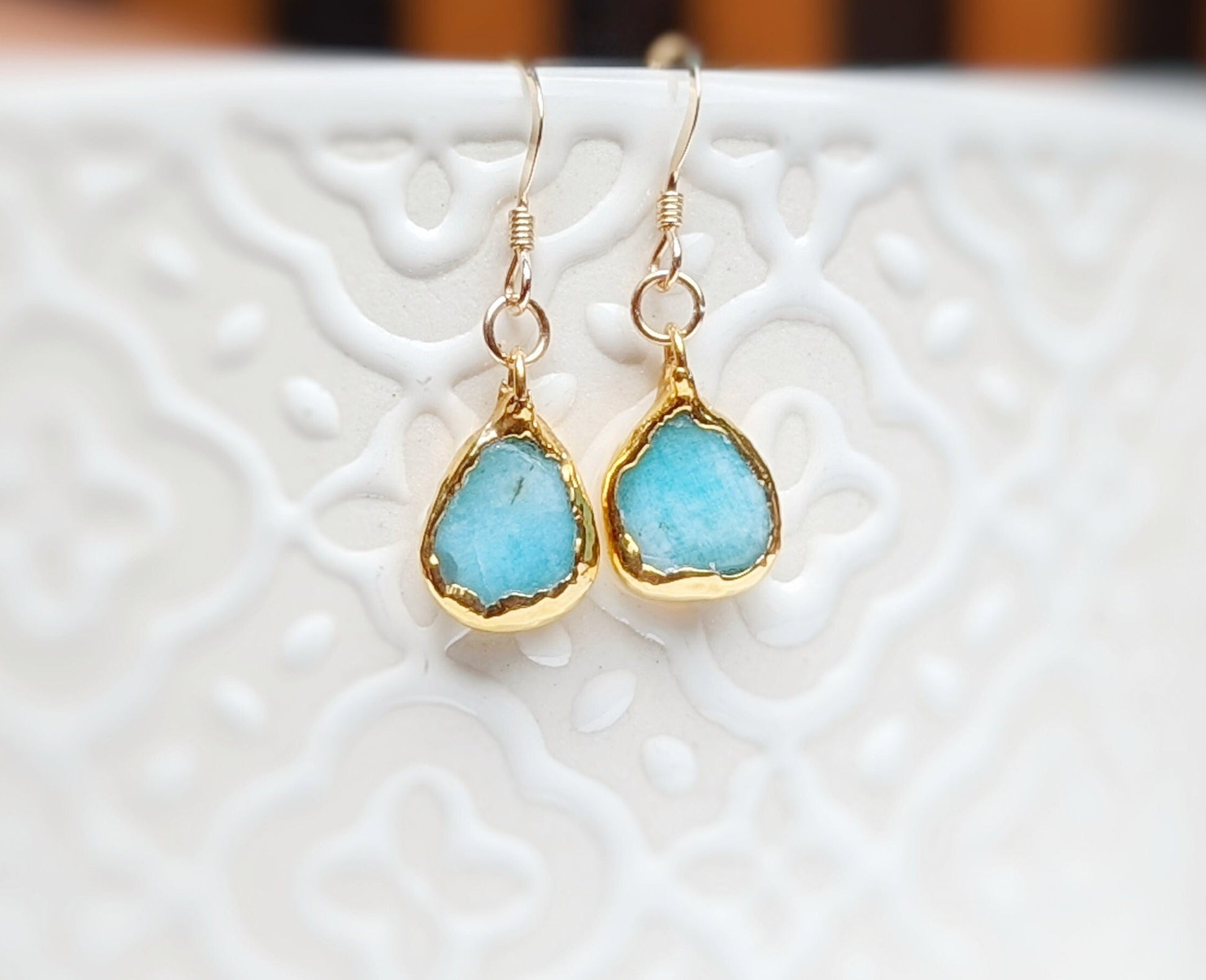 Aqua blue Amazonite dangle earrings with teardrop stones on gold-filled hooks, perfect for gifts and special occasions.