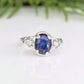 Blue Sapphire and raw diamond engagement ring in solid sterling silver with textured design.