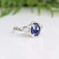 Blue sapphire and raw diamond engagement ring in solid sterling silver showcasing a nature-inspired design.