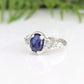 Blue Sapphire and raw diamond engagement ring in solid sterling silver, showcasing unique hand-carved design and natural elegance.