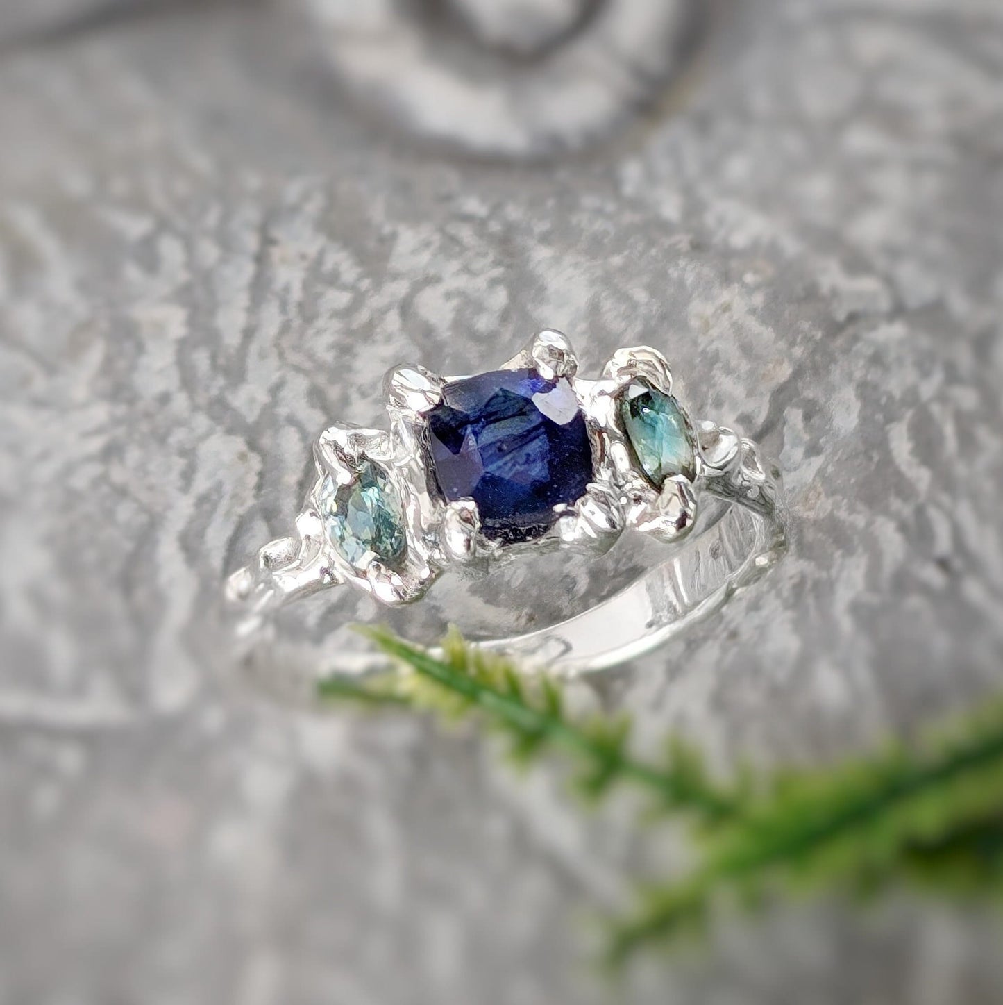 Elegant Blue Sapphire and Tourmaline engagement ring in Solid 14k Gold, featuring a square sapphire and teal gemstones.