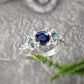 Elegant Blue Sapphire and Tourmaline engagement ring in Solid 14k Gold, featuring a square sapphire and teal gemstones.