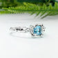 London Blue Topaz engagement ring in solid sterling silver with organic textured band.