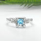 Blue Topaz engagement ring in solid sterling silver with an organic textured band.