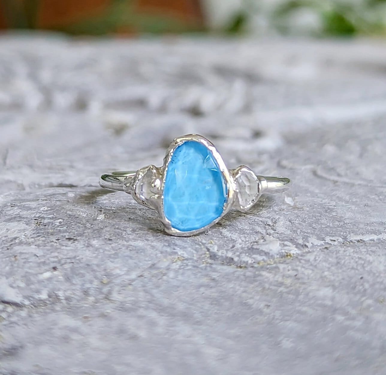 Blue Topaz and Herkimer diamond engagement ring set in sterling silver, showcasing a unique rose cut design.