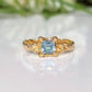 Handcrafted solid 14k gold engagement ring featuring a London Blue Topaz in an organic textured band.