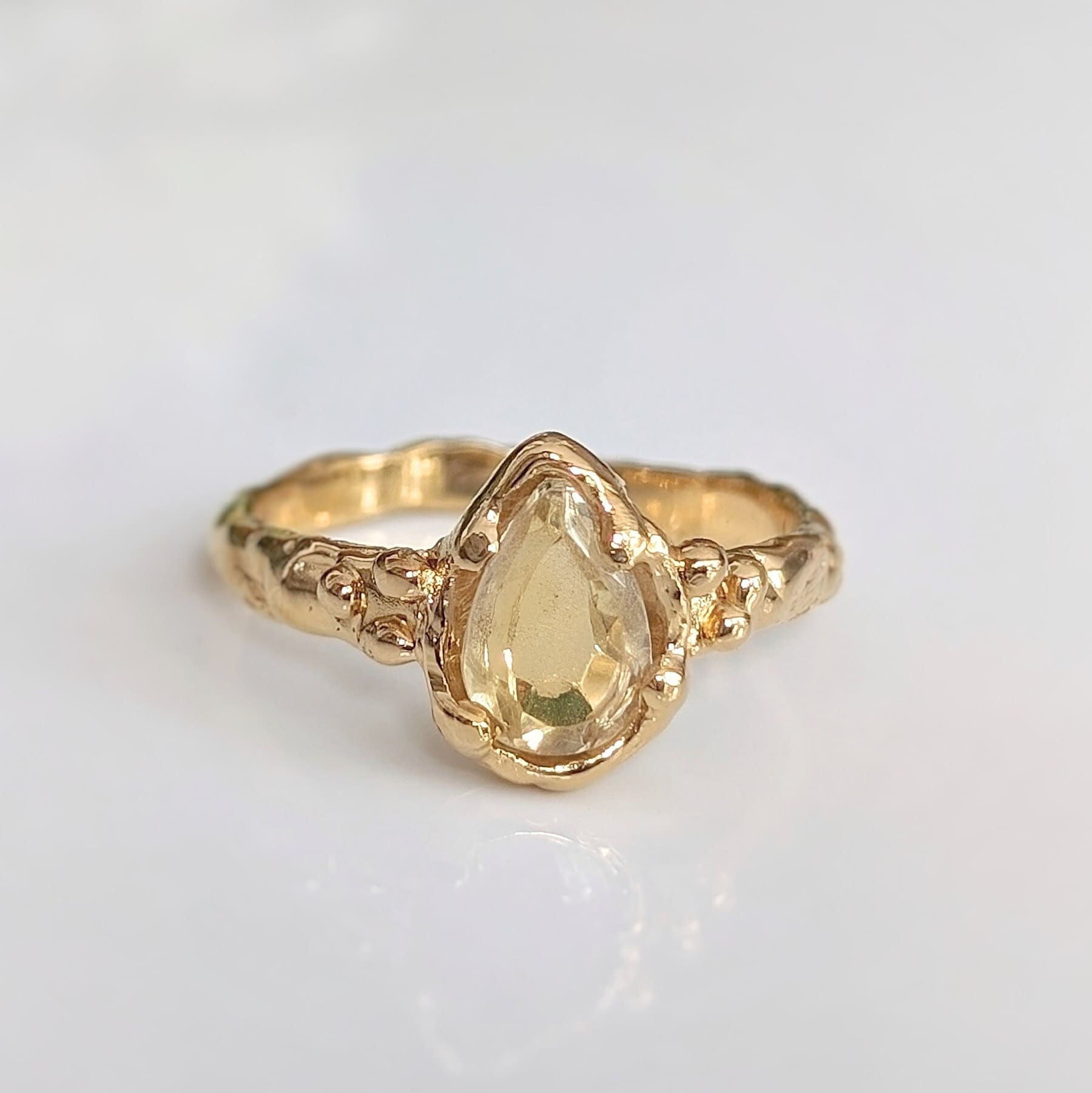 Stunning pear shape Citrine ring in handmade solid 14k gold with textured band, perfect for engagements and November birthdays.