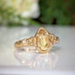 Handcrafted Citrine ring in solid 14k gold with a pear-shaped yellow crystal and an organic molten band.