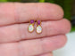 Dainty raw Ruby and Opal stud earrings, handcrafted design, perfect for bridal or everyday elegance.