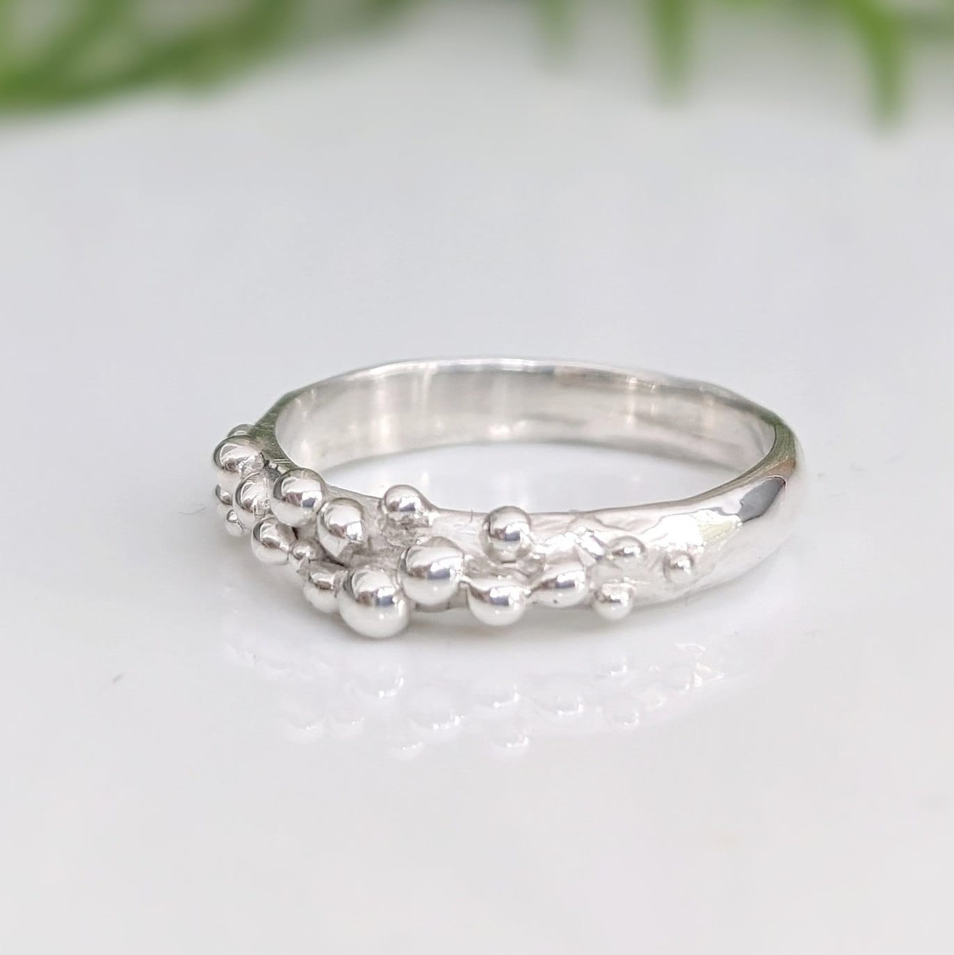 Dew Drop textured silver ring with beaded design, handcrafted in molten silver, perfect as a stacking or wedding band.