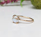Freshwater Keshi pearl solitaire ring in 18k gold with soft reflections, perfect for engagement or special occasions.