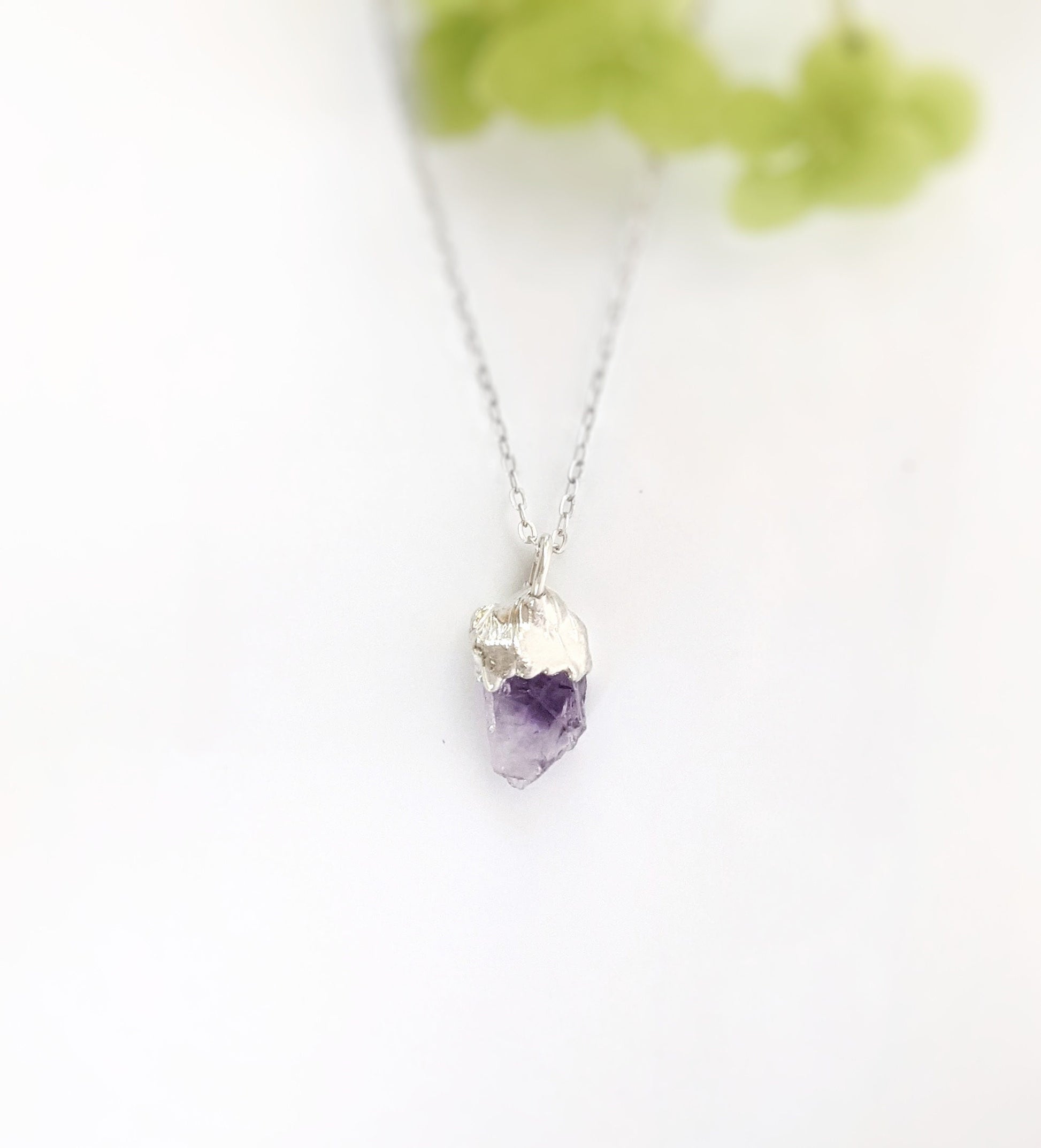 Raw amethyst crystal necklace on sterling silver chain, perfect unique gift for birthdays or special occasions.