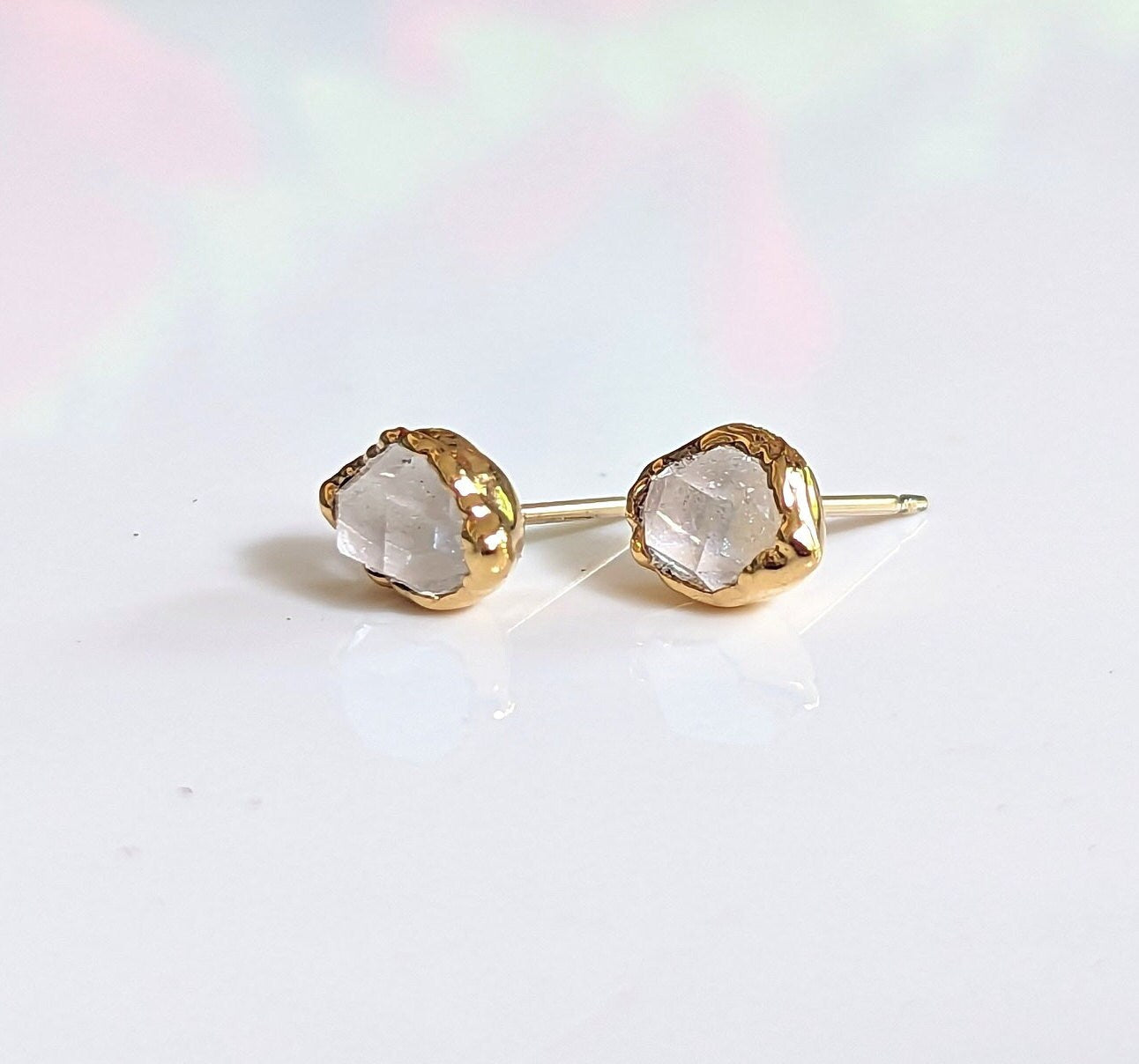 Handcrafted Herkimer diamond stud earrings with gold accents, perfect for bridal or everyday elegance.