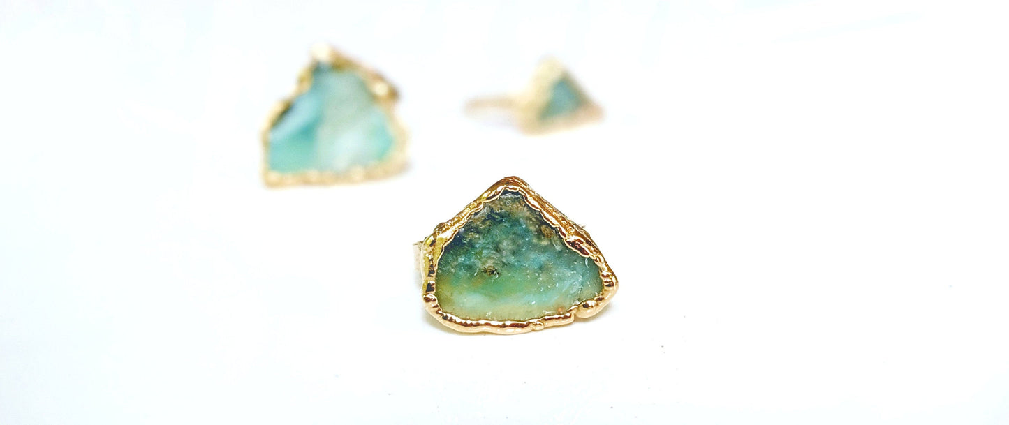 Handcrafted raw Peruvian opal ring with aqua blue stone on a gold filled band.