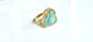 Handcrafted raw Peruvian opal ring with aqua blue stone set in a 14k gold filled band.