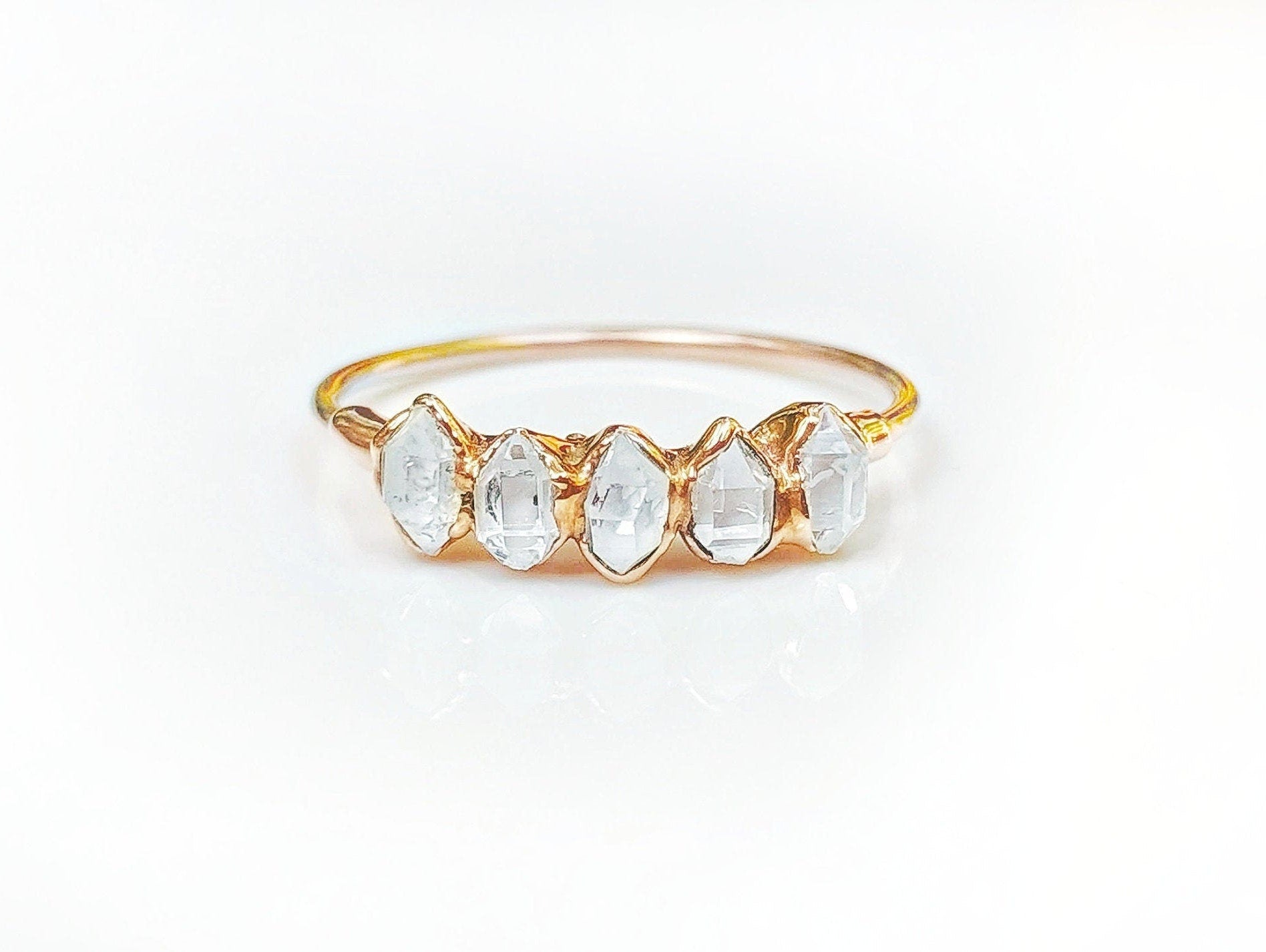 Herkimer diamond Eternity ring featuring five raw diamonds set in 18k gold, a perfect symbol of everlasting love.