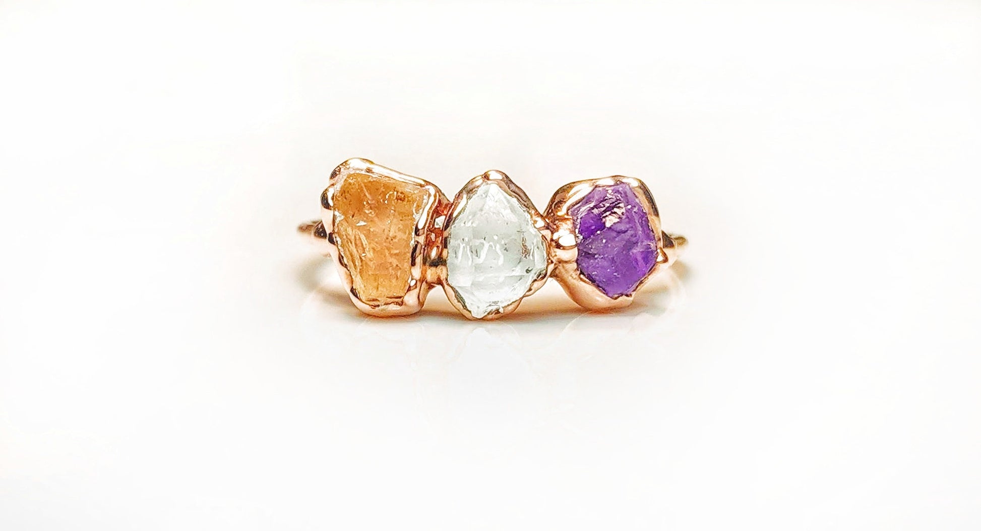 Customized family birthstone ring with raw gemstones in gold settings, perfect Mother's day gift.
