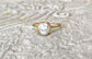 Handcrafted small Keshi pearl ring on a solid 14k gold band, showcasing elegance and simplicity.