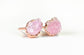 Raw Rose Quartz stud earrings on rose gold posts, embodying self-love and happiness.
