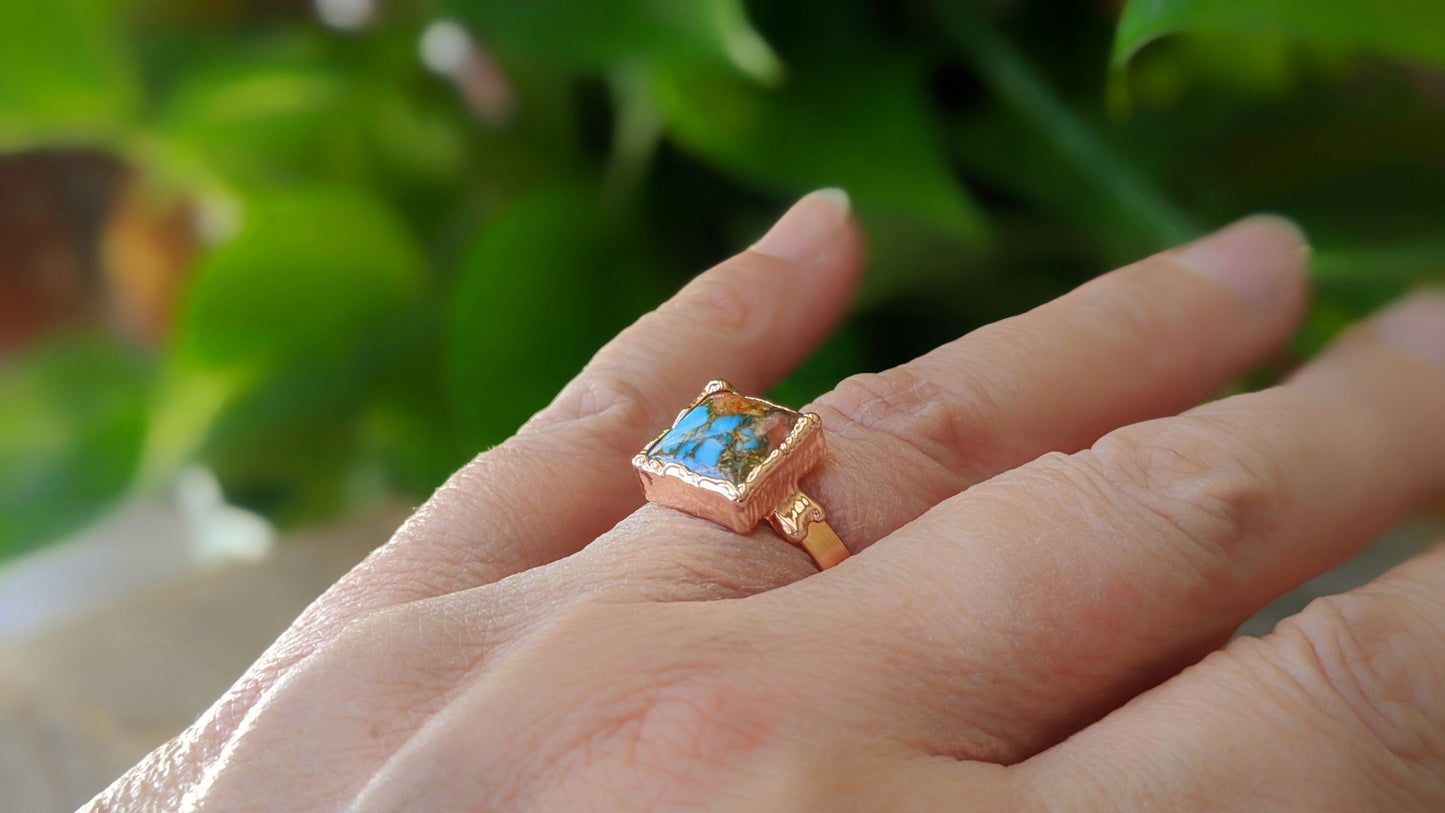 Handcrafted Spiny Oyster Copper Turquoise ring on a hand, showcasing unique gemstone design and 14k Gold filled band.