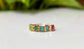 Raw Tourmaline eternity ring with multi-color stones on a gold filled band, perfect for any occasion.