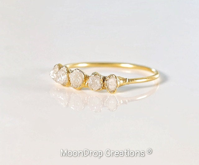 Handcrafted raw diamond Eternity ring in 18k gold setting, showcasing five uncut diamonds.