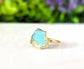 Raw Peruvian Opal ring with aqua blue stone set in 14k gold filled band, handcrafted design.