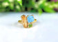 Raw Topaz, Aquamarine and Peridot cluster ring on a gold filled band, perfect for summer style.