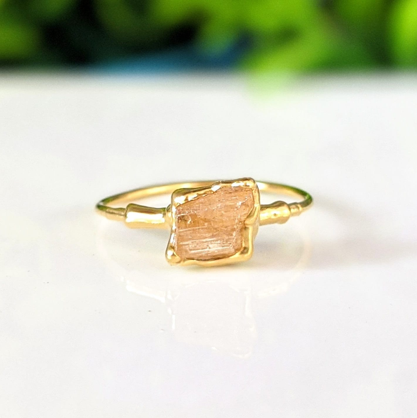 Raw Golden Imperial Topaz ring in gold setting, perfect for gifts and special occasions like birthdays and anniversaries.