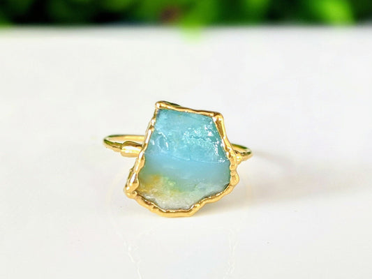Handcrafted raw Peruvian opal ring on a 14k gold filled band with aqua blue gemstone.