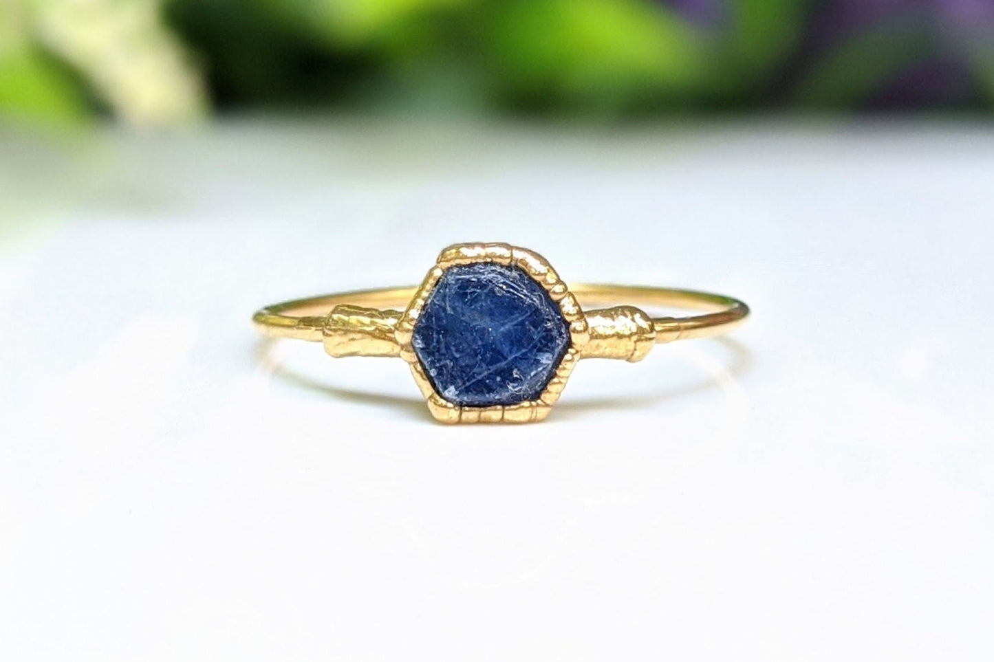 Hexagon-shaped raw blue sapphire ring set in gold, handcrafted design, perfect for gifts and special occasions.