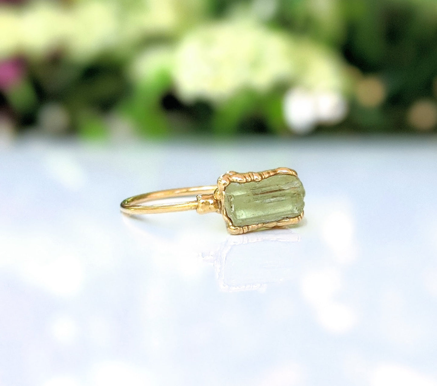 Raw yellow Apatite ring with 14k gold filled band showcasing unique natural gemstone.