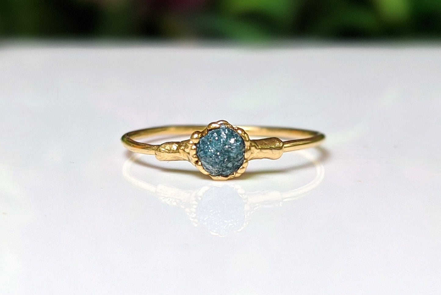 Raw blue diamond engagement ring on solid 18k gold band, handcrafted and perfect for Valentine's Day.