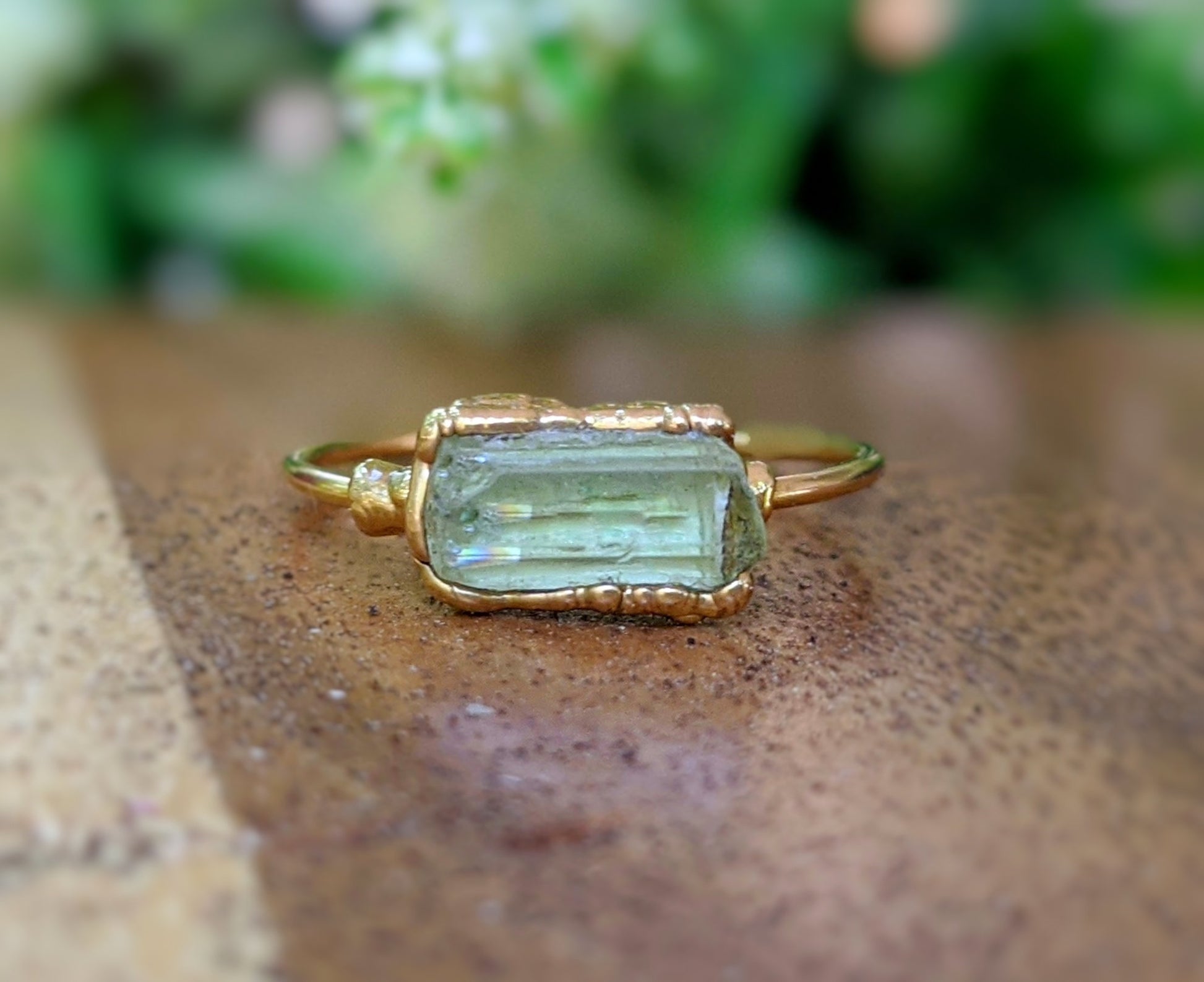 Raw yellow Apatite ring with gold filled band, featuring a unique electroformed bezel setting.