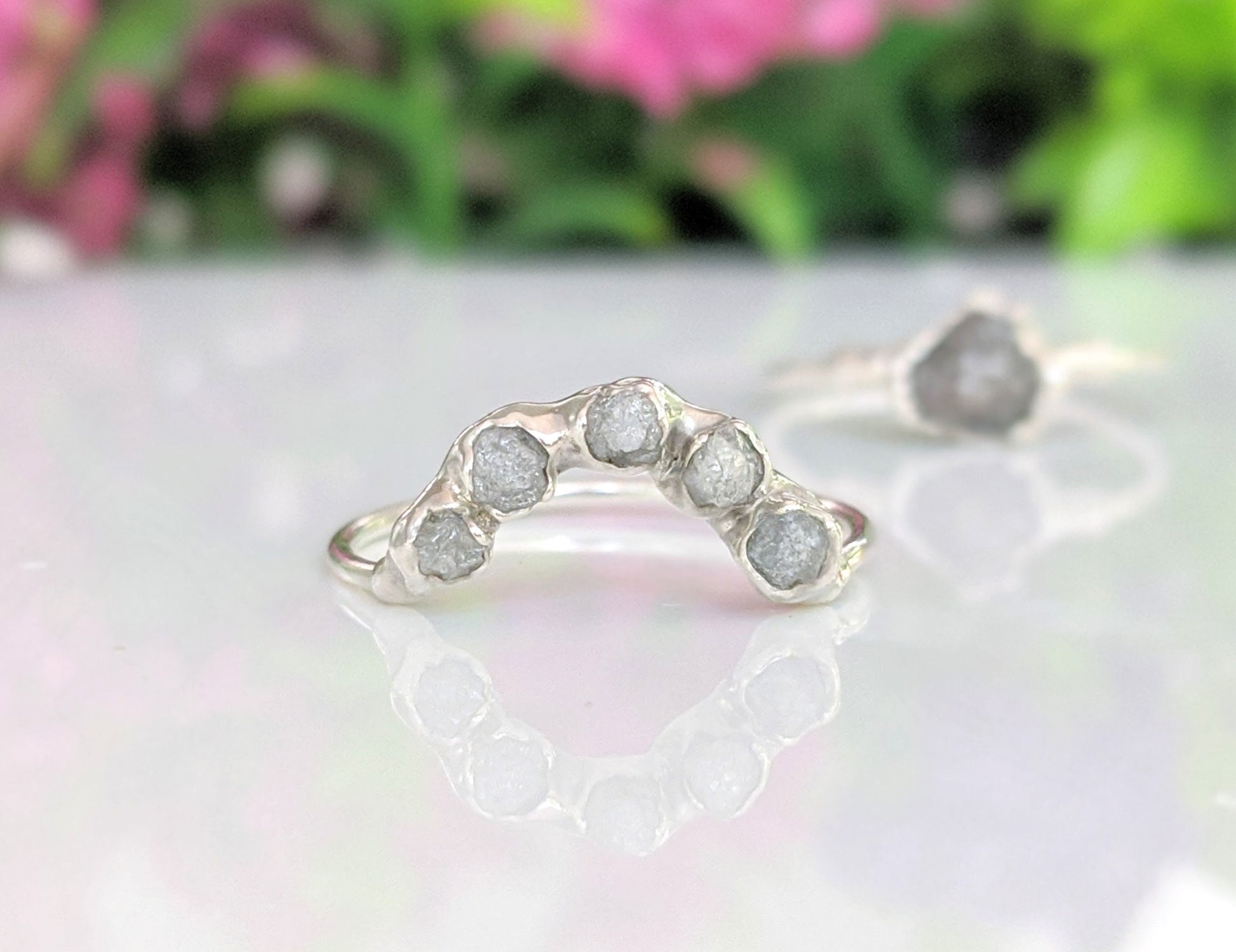Handcrafted raw diamond Chevron wedding ring set featuring silver-grey diamonds on a delicate sterling silver band.