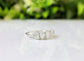 Dainty Silver Eternity ring featuring five raw Herkimer diamonds on a shining band, handcrafted and unique.