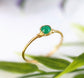 Dainty emerald stacking ring featuring a 4mm natural green emerald set in a 14k gold filled band.