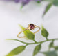 Dainty gold filled stacking ring featuring a natural red Garnet gemstone, ideal for January birthdays and everyday wear.