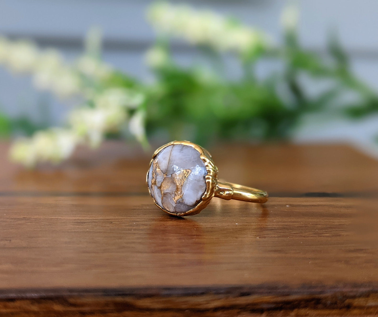 Stunning 18k gold-plated ring featuring a natural white crystal copper stone on a gold-filled band.
