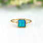Blue Opal ring in 18k Gold with aqua blue square cultured Opal on a delicate band.