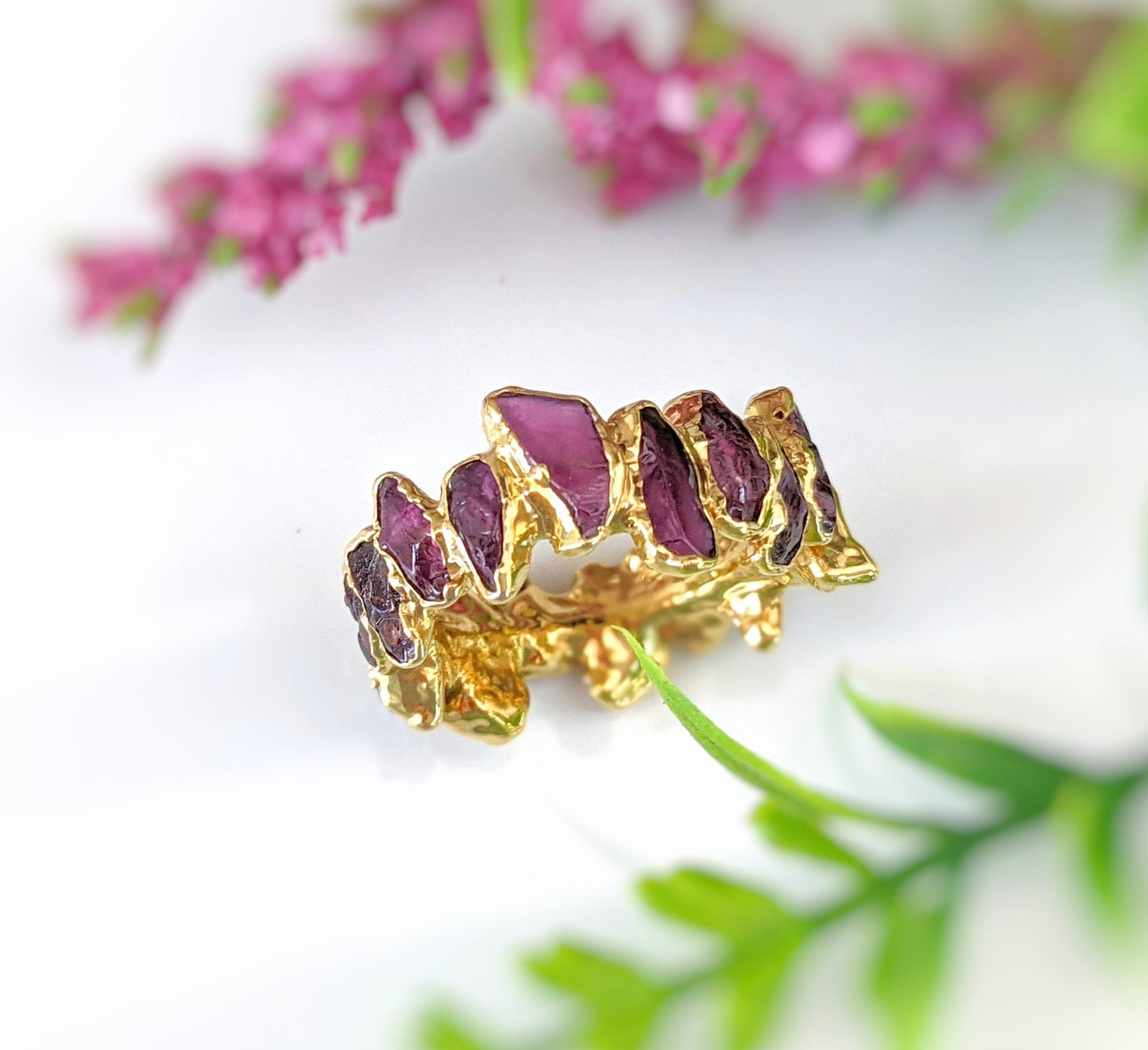 Raw Rhodolite Garnet eternity ring with gold filled 14k band and unique gemstone design.