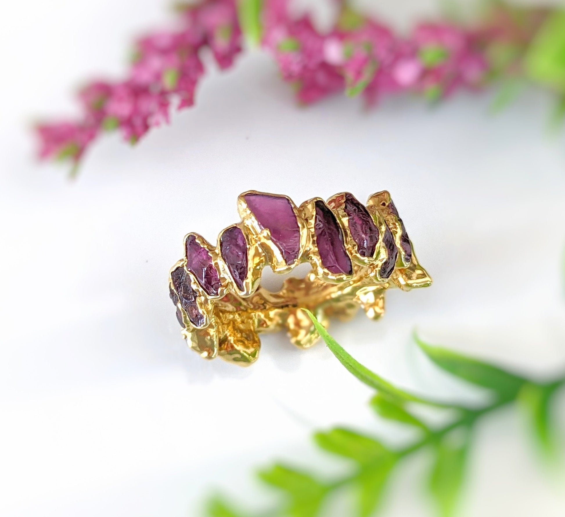 Raw Rhodolite Garnet eternity ring with gold filled 14k band and unique gemstone design.