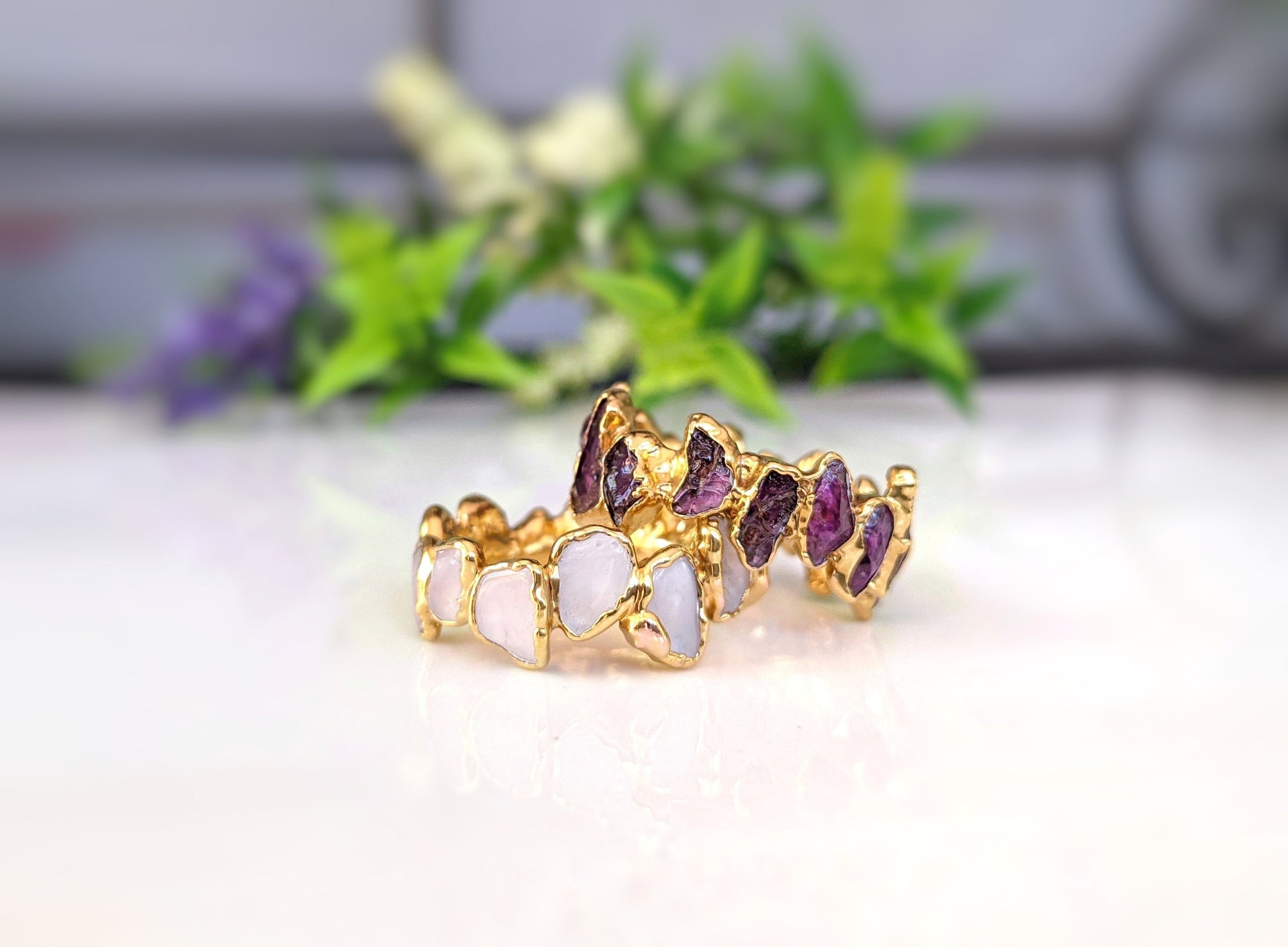 Raw Rhodolite Garnet Eternity Ring with gold-filled band and unique gemstone design.