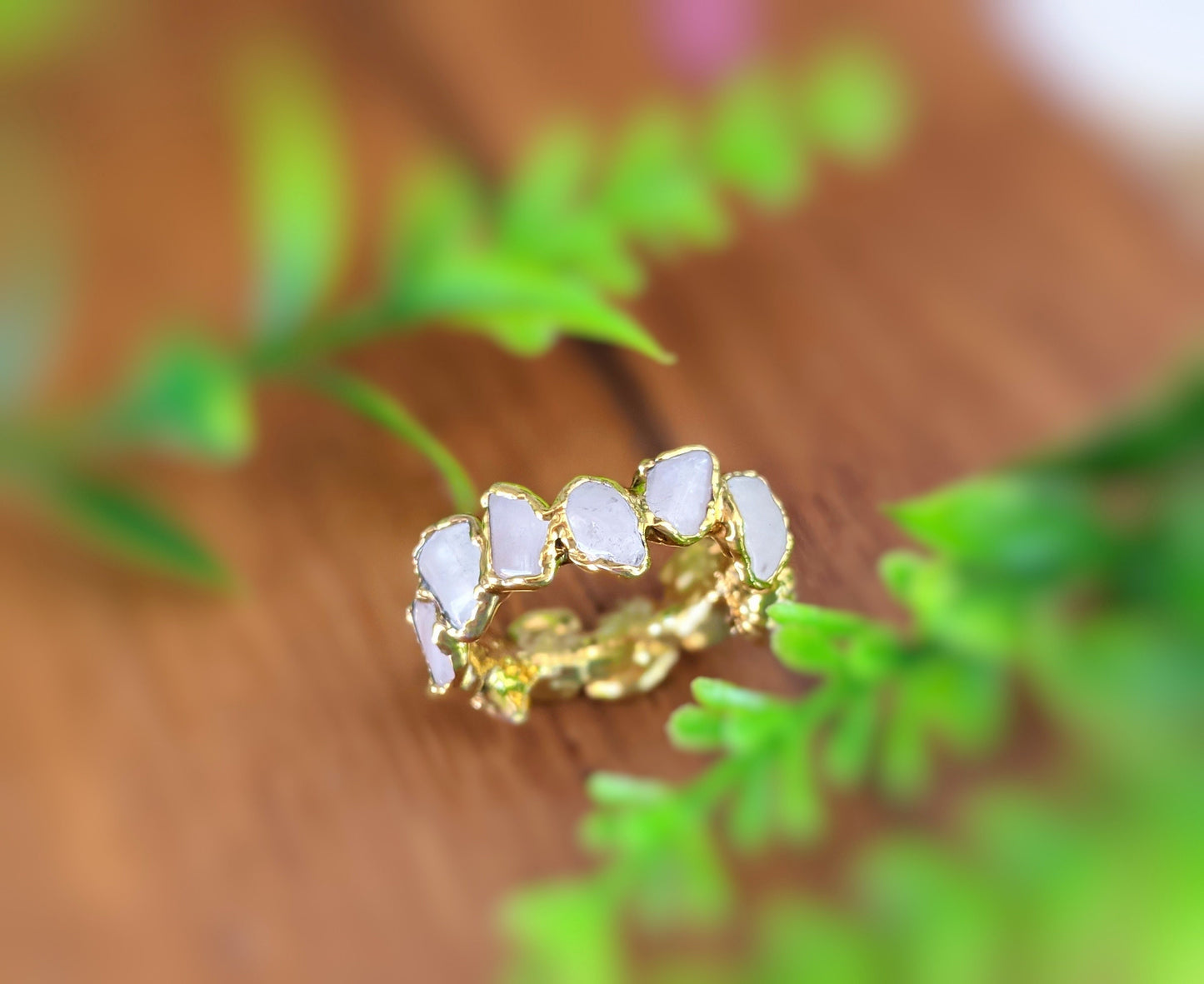 Rose Quartz eternity gold ring featuring unique shapes and gemstones, set on a 14k gold filled band.
