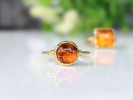 Baltic Amber gold ring with 8mm natural amber stone, set on a hammered 14k gold filled band.