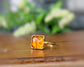 Honey-colored square Baltic Amber ring on a 14k gold-filled band, handcrafted with natural gemstones.