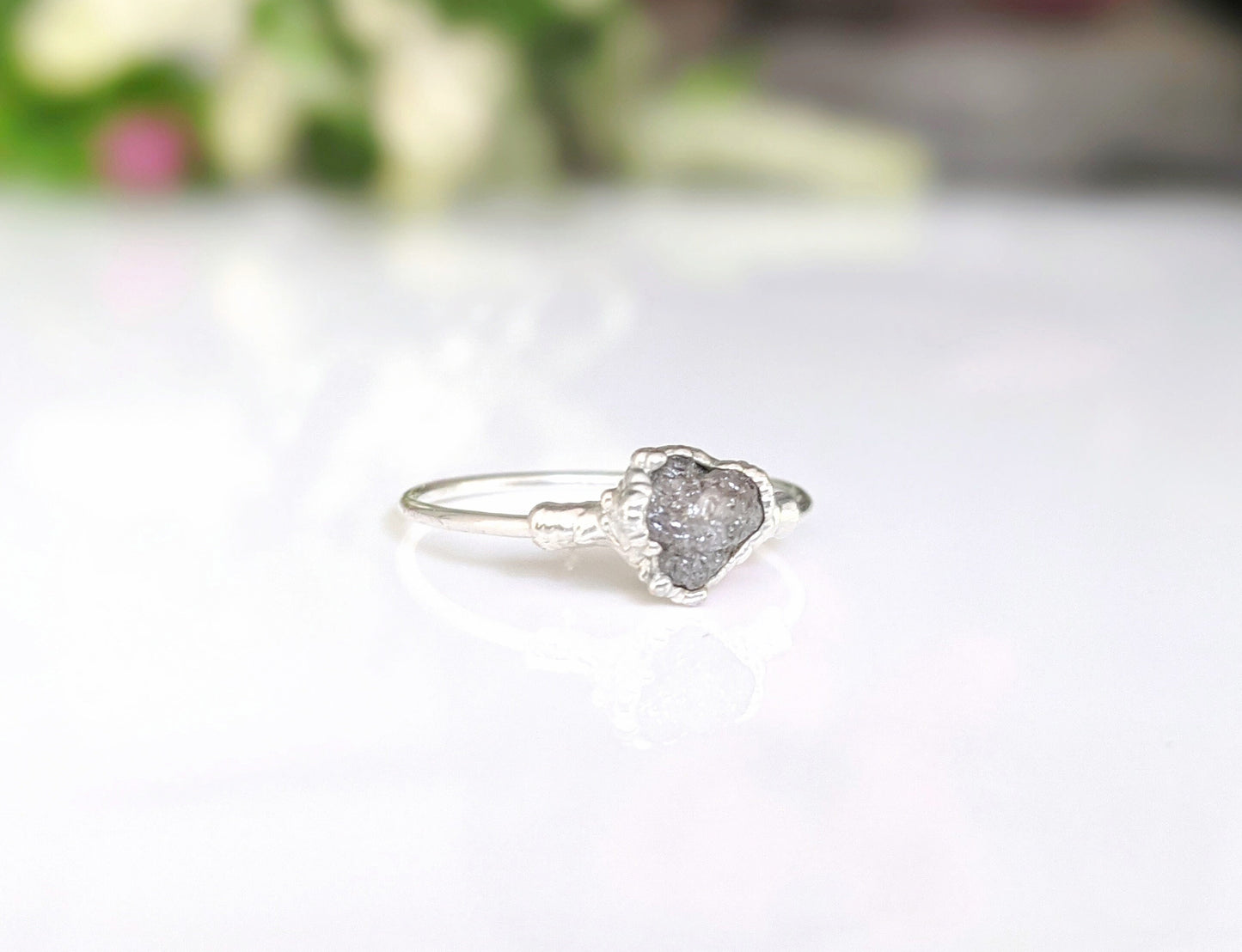 Raw uncut grey diamond engagement ring on Sterling Silver band, unique handcrafted design for special occasions.