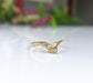 Delicate raw diamond Chevron ring in 18k gold, featuring three unique conflict-free diamonds, perfect for engagement.