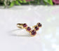 Ruby Chevron ring in 18k gold showcasing natural rubies, perfect for weddings and anniversaries, celebrating love.
